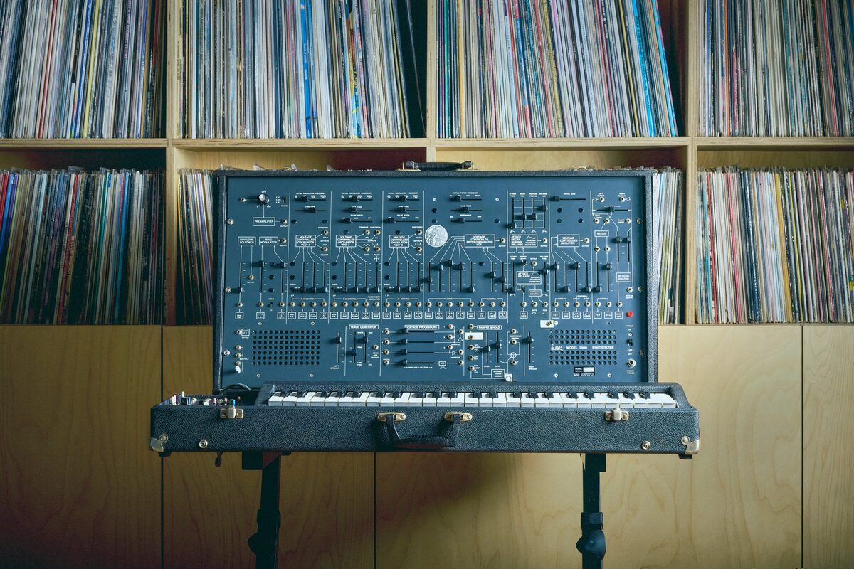 ARP 2600 against a wall of records
